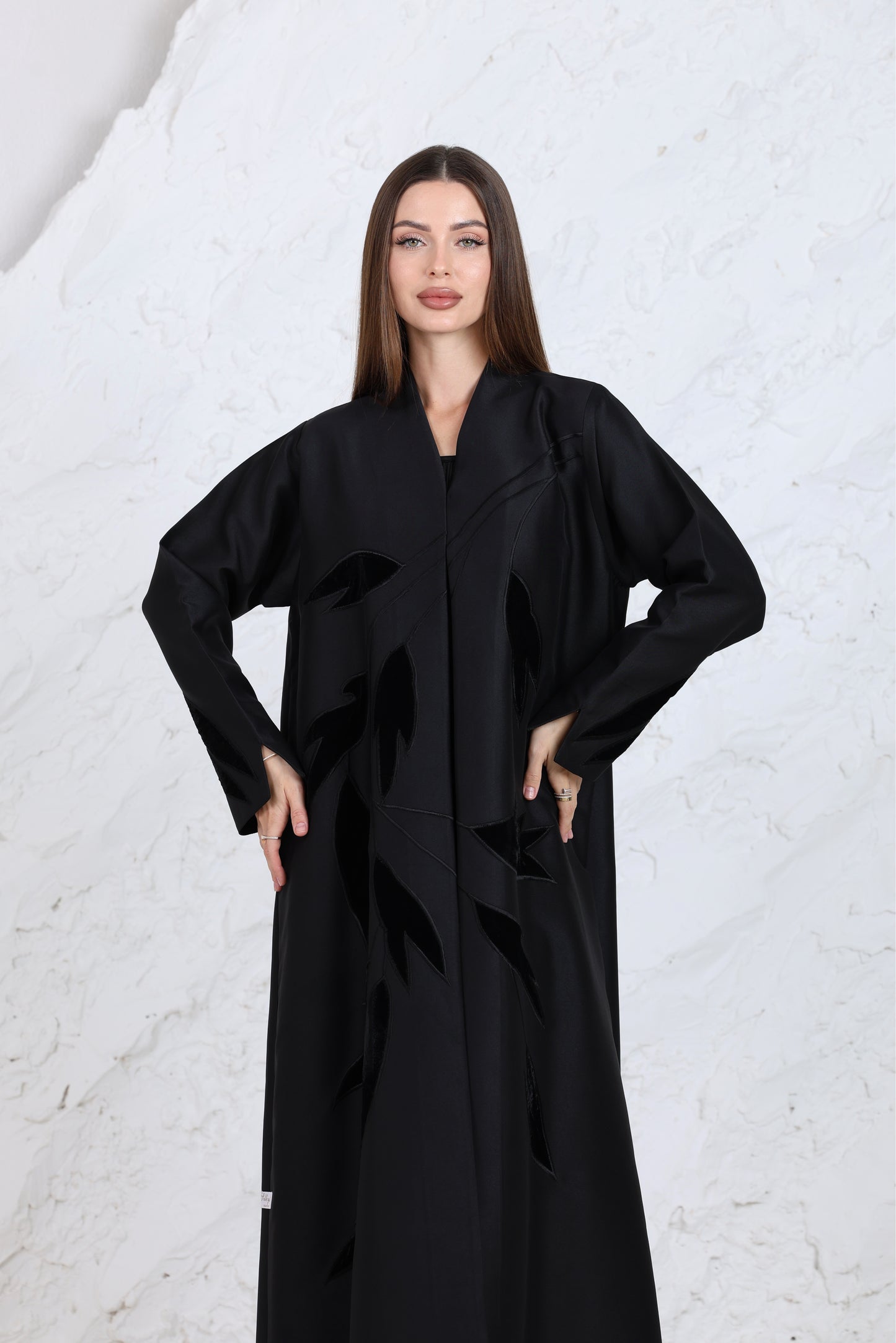 Close-up of black embroidered abaya fabric