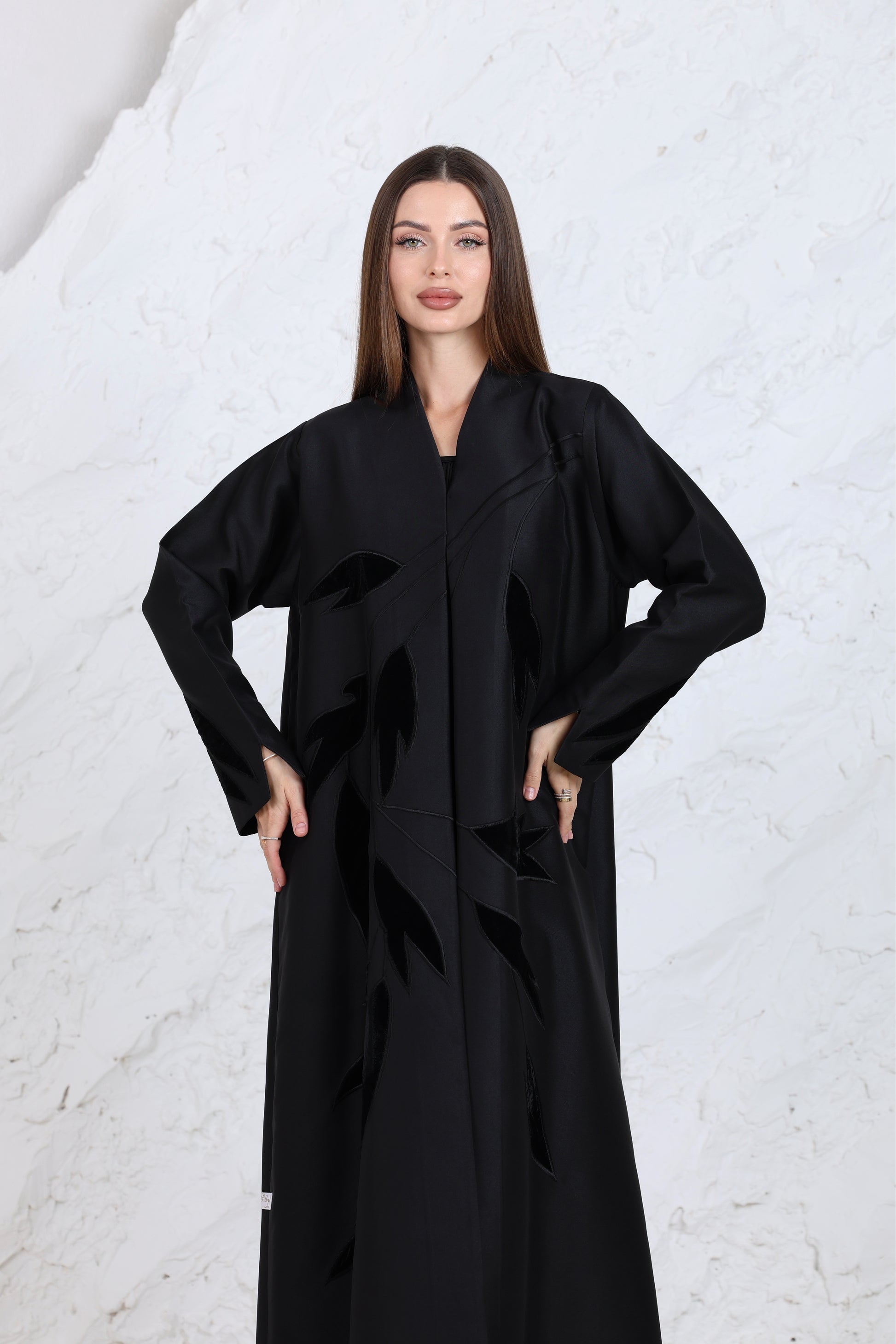 Close-up of black embroidered abaya fabric