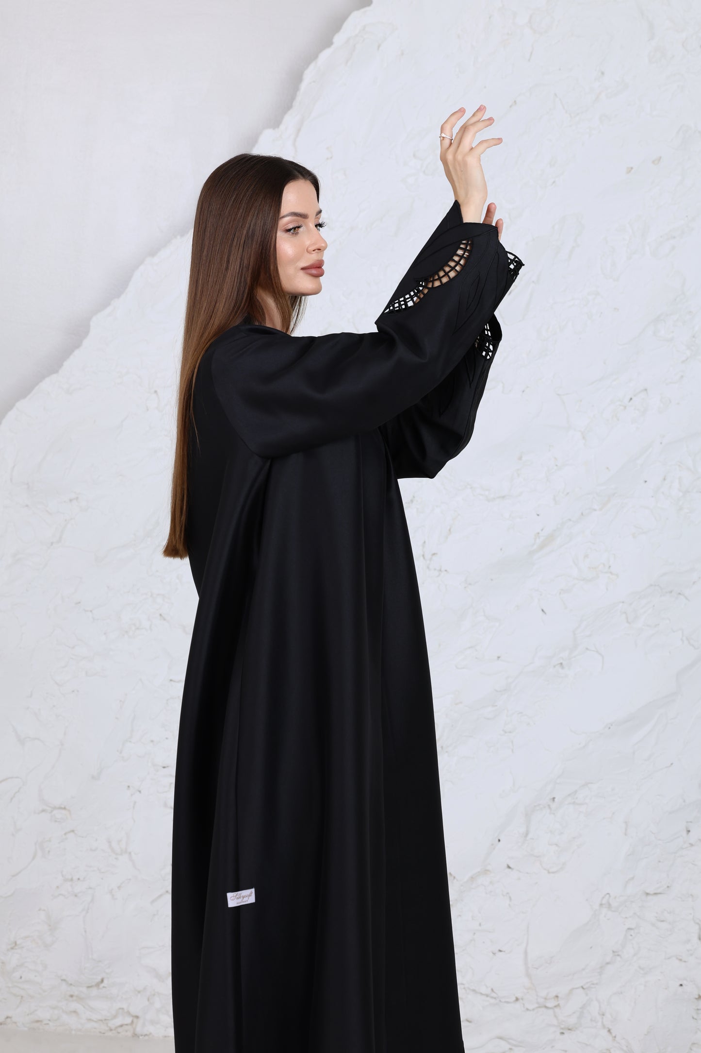Elegant black abaya with cutout sleeve design for traditional & ceremonial clothing